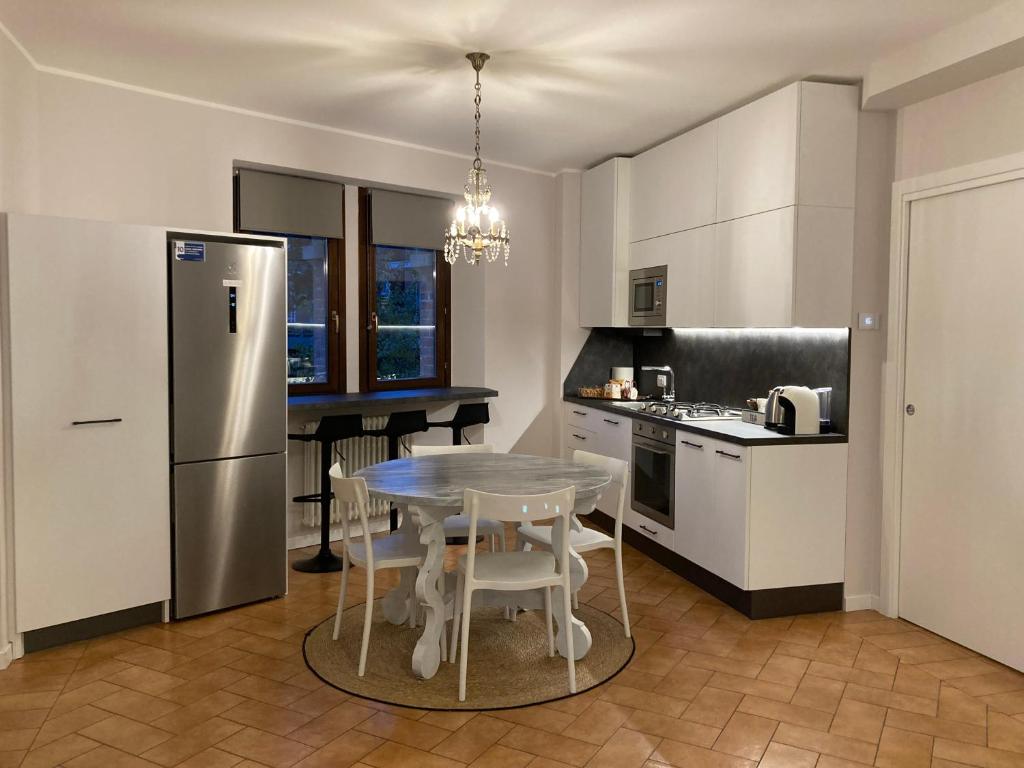 Kuchyň nebo kuchyňský kout v ubytování Residenza Le Fornaci