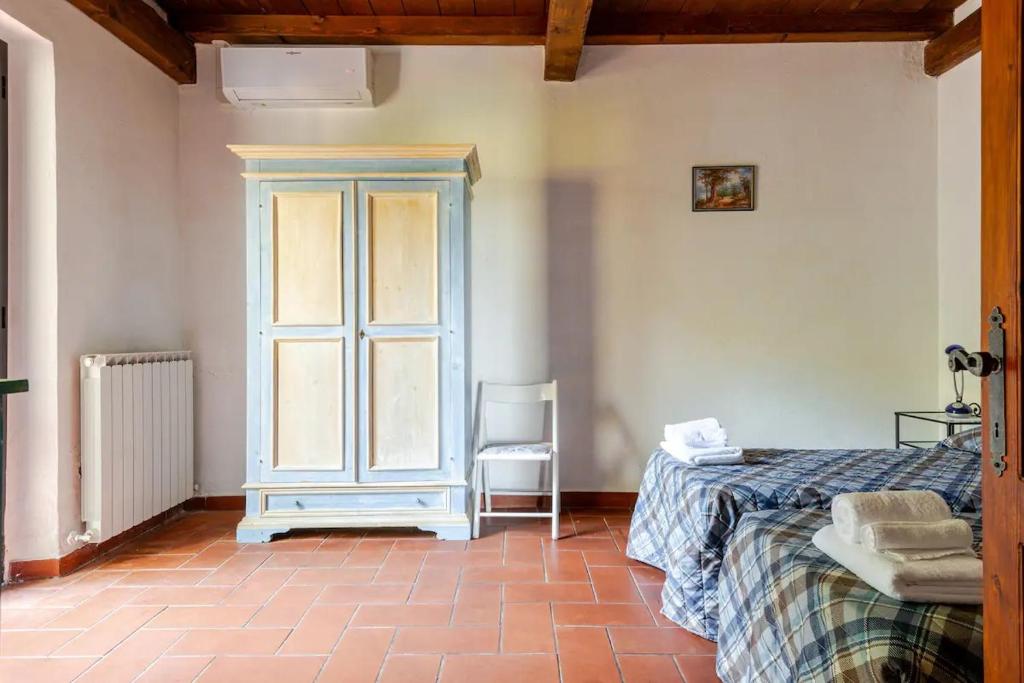 Postel nebo postele na pokoji v ubytování AgriHouse Orvieto