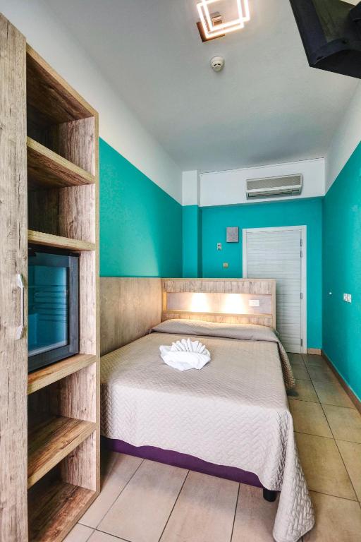 Postel nebo postele na pokoji v ubytování Hotel Alba D'Oro