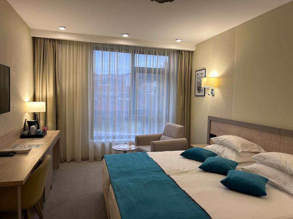 Postel nebo postele na pokoji v ubytování Hotel Siesta
