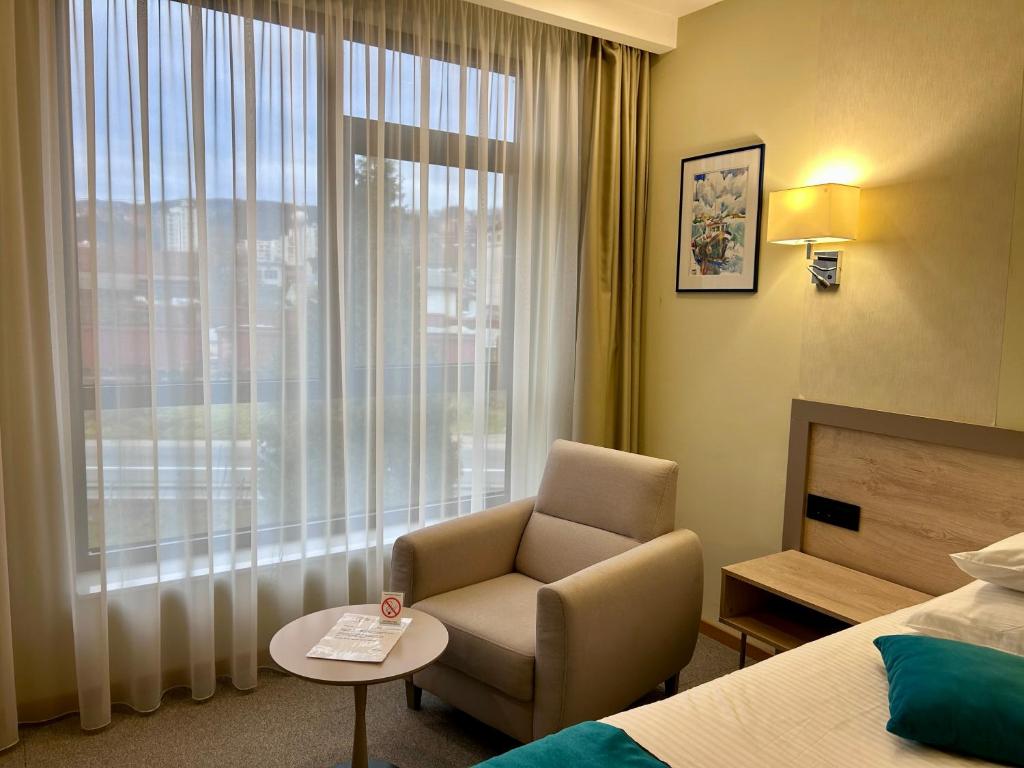 Postel nebo postele na pokoji v ubytování Hotel Siesta
