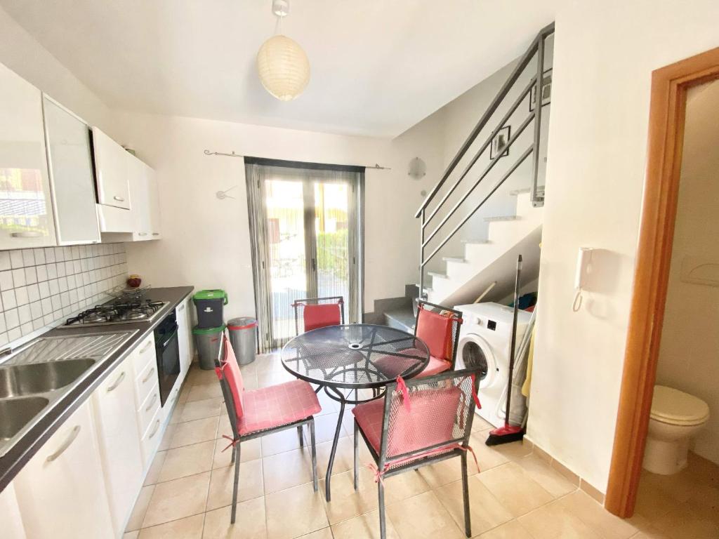 Kuchyň nebo kuchyňský kout v ubytování Isca Calabretta Apartments M2
