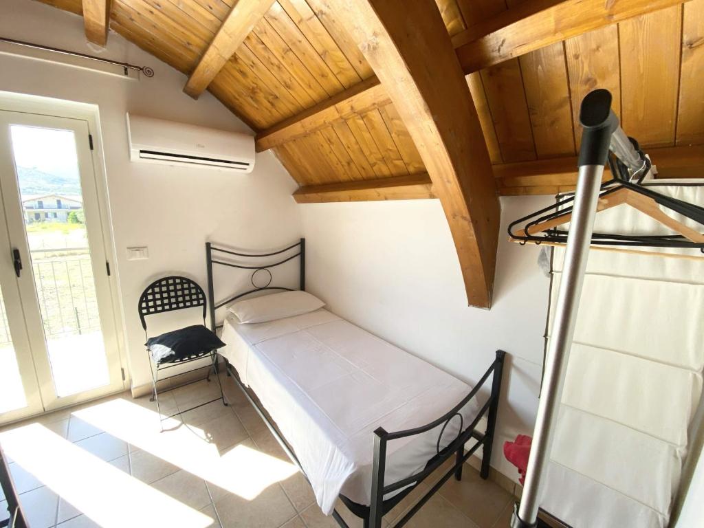 Postel nebo postele na pokoji v ubytování Isca Calabretta Apartments M2