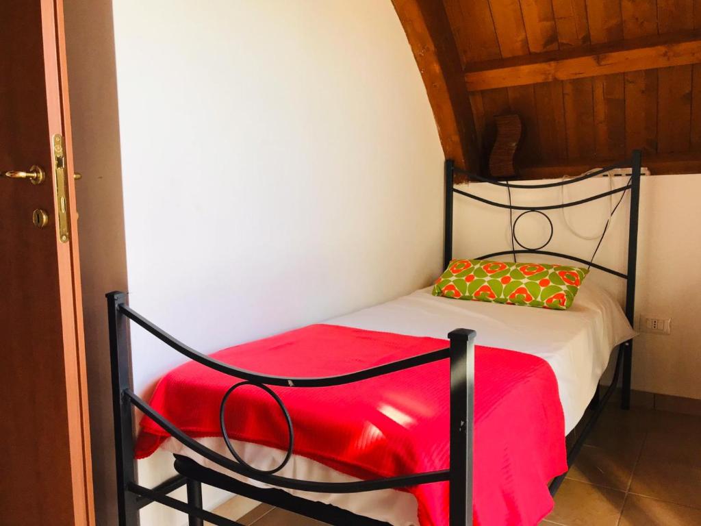 Postel nebo postele na pokoji v ubytování Isca Calabretta Apartments M2