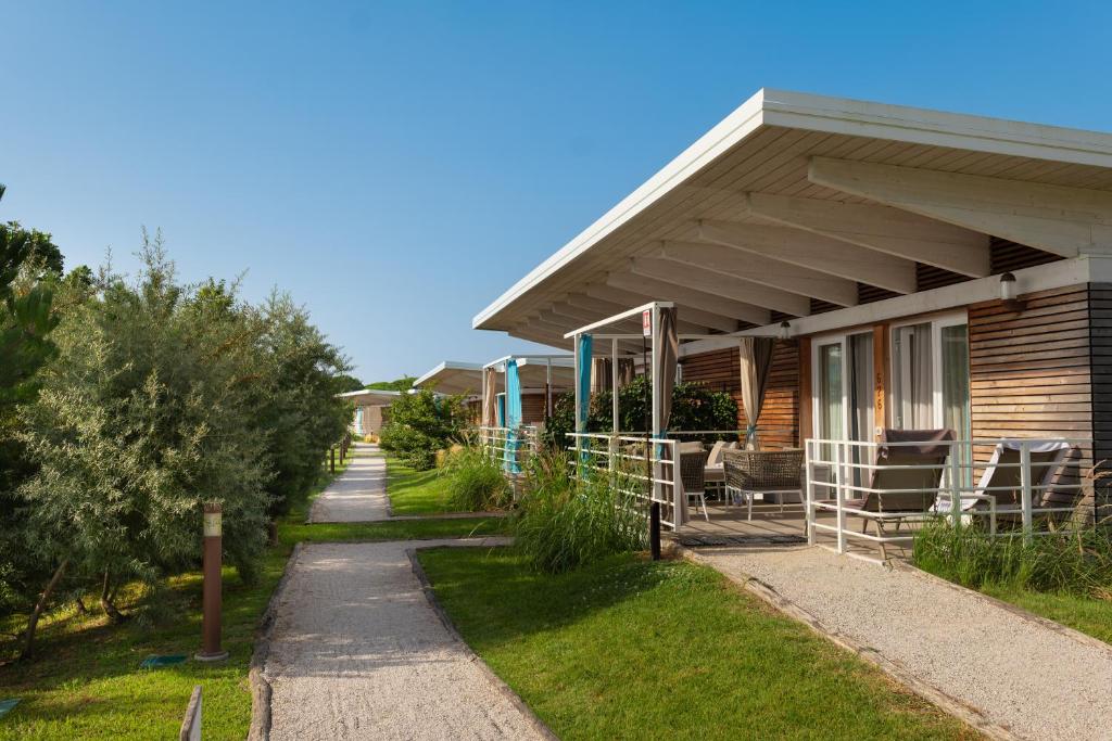 Сад в Lino delle Fate Eco Resort
