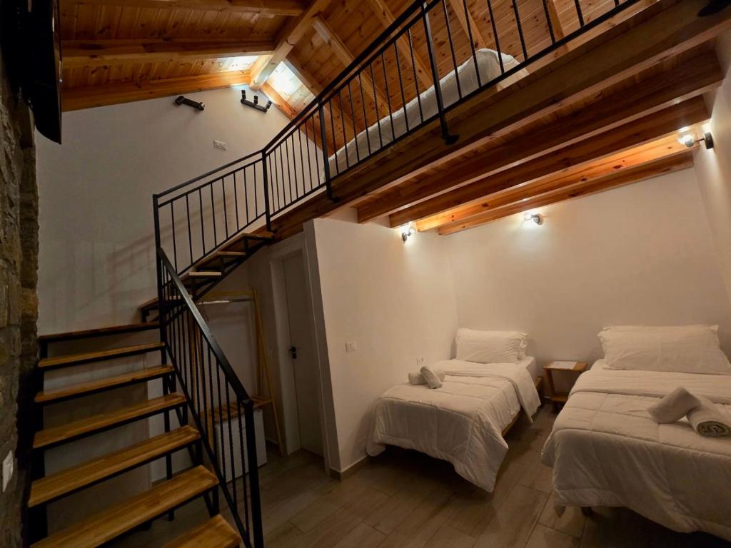 Voodi või voodid majutusasutuse Gogo Moustache Guest House toas