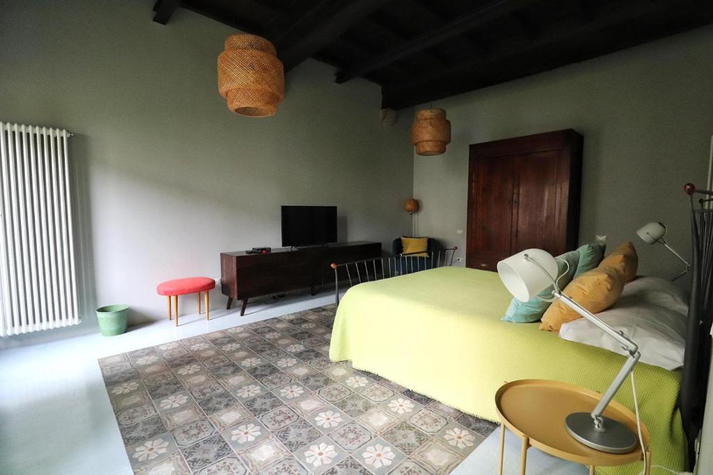 Postel nebo postele na pokoji v ubytování B&B Villa Natta