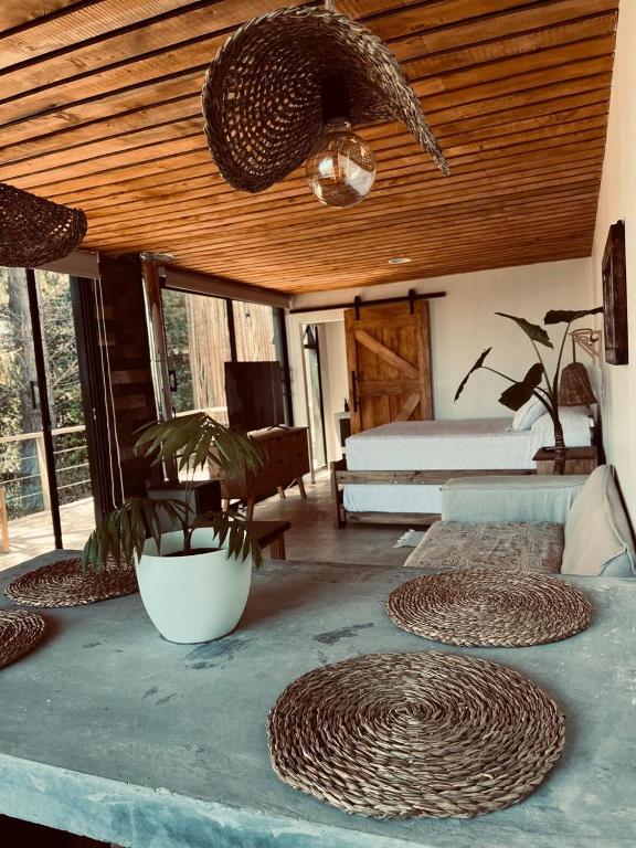 Кровать или кровати в номере Cabaña Quillay by Alto Curanipe