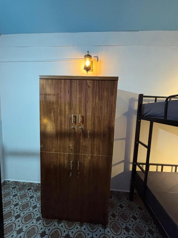 Postel nebo postele na pokoji v ubytování Hungama Hostel & Cafe - By SK