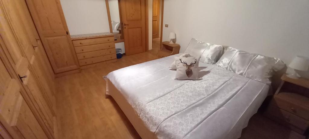 En eller flere senge i et værelse på Mansarda nelle Dolomiti