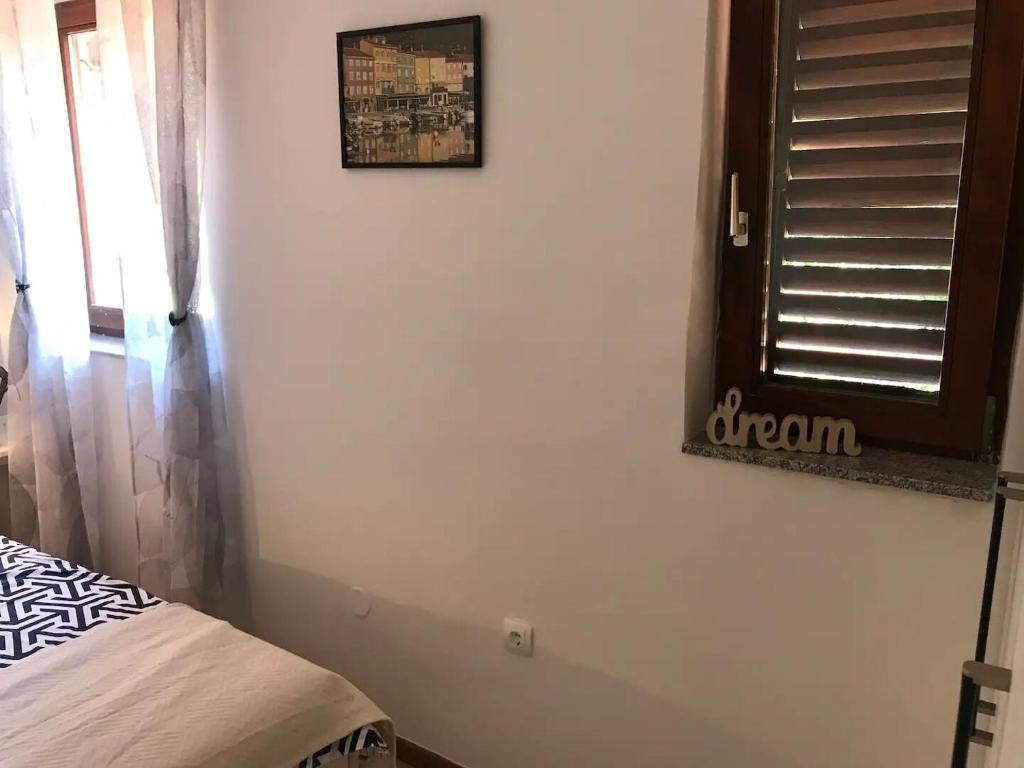 Postel nebo postele na pokoji v ubytování Apartment Luki