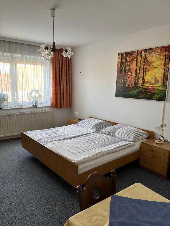 Postel nebo postele na pokoji v ubytování Pension Eicher