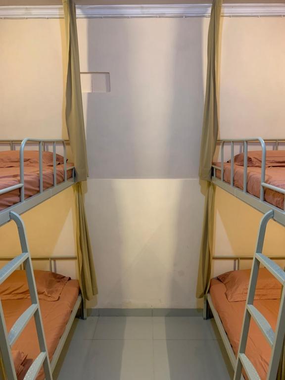 Postel nebo postele na pokoji v ubytování Backpacker Space
