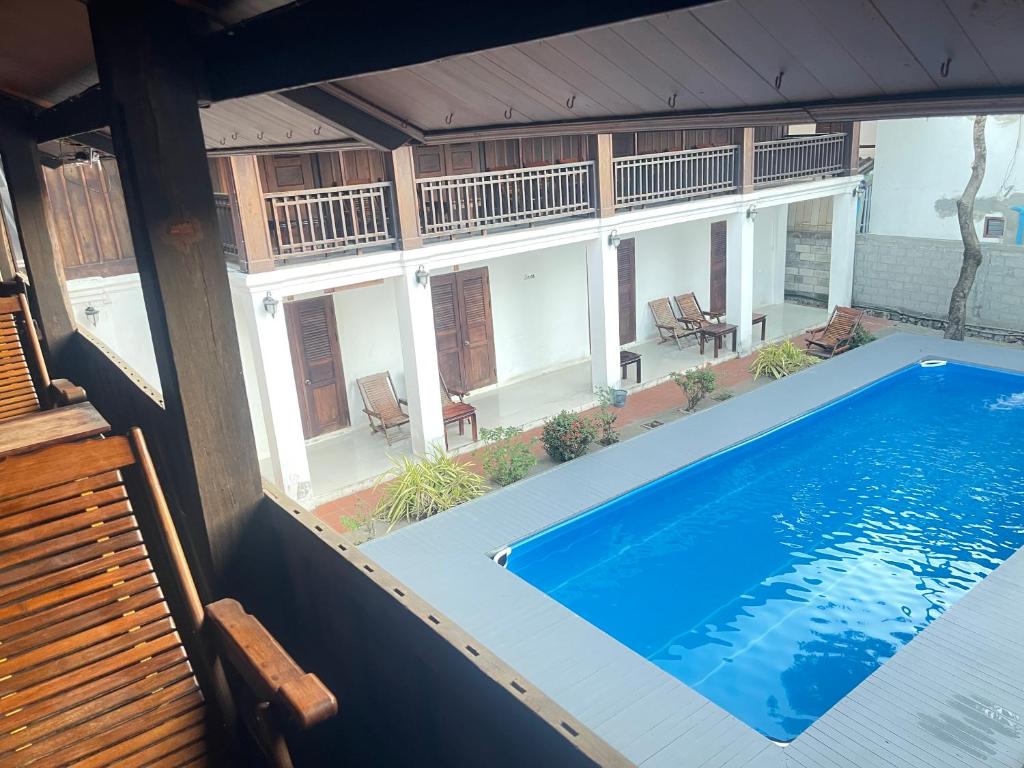 a view of a swimming pool in a house at Residence Boutique Hotel in Luang Prabang