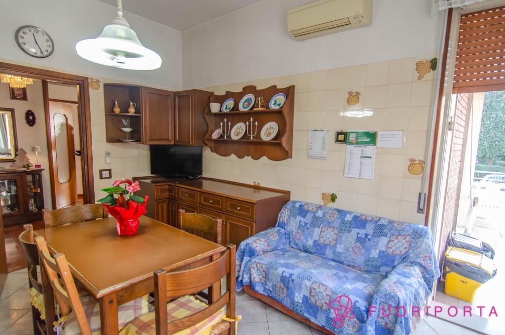 Televízia a/alebo spoločenská miestnosť v ubytovaní Incantevole Residenza Retro