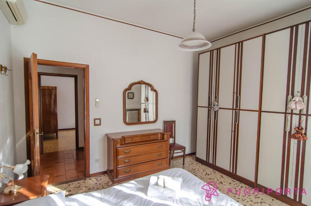 Posteľ alebo postele v izbe v ubytovaní Incantevole Residenza Retro