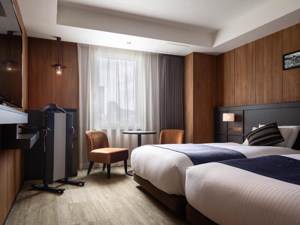 Postel nebo postele na pokoji v ubytování Mitsui Garden Hotel Otemachi - Tokyo