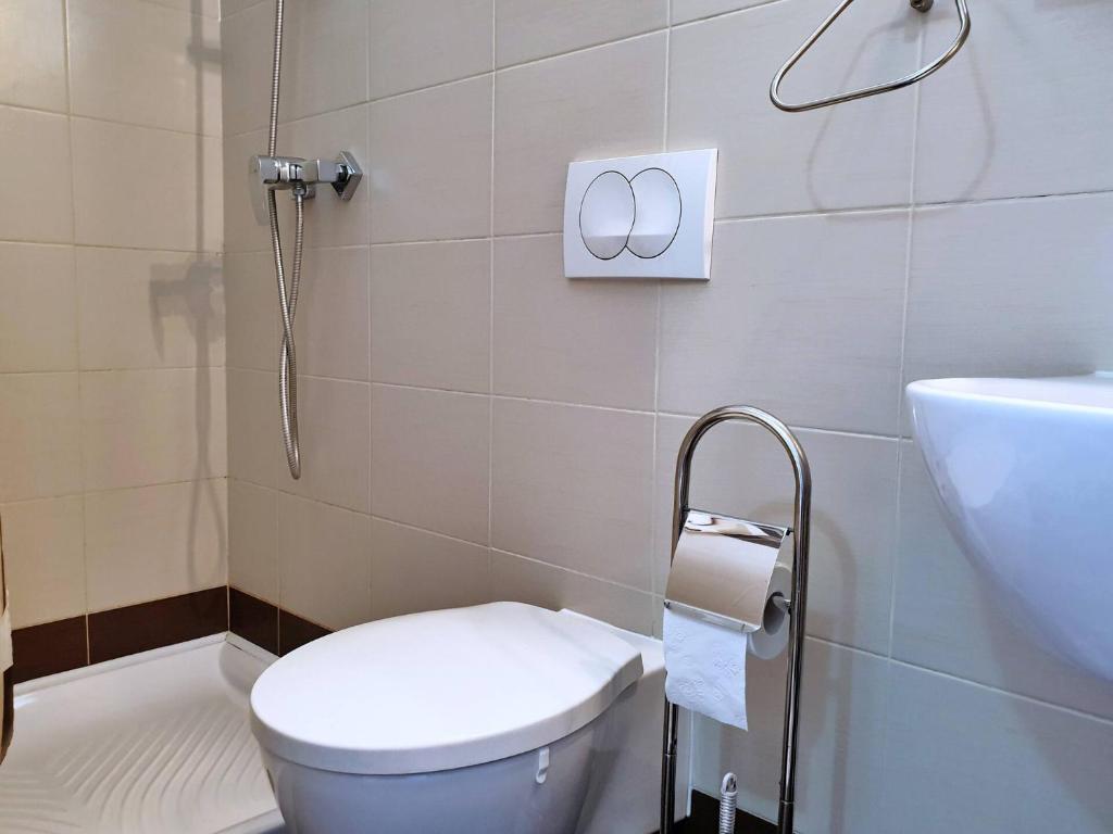 Koupelna v ubytování Apartments Rea