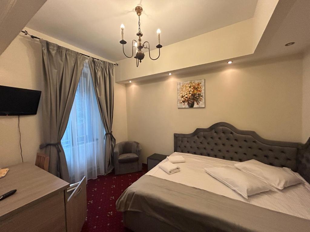 TV a/nebo společenská místnost v ubytování Hotel Stavilar