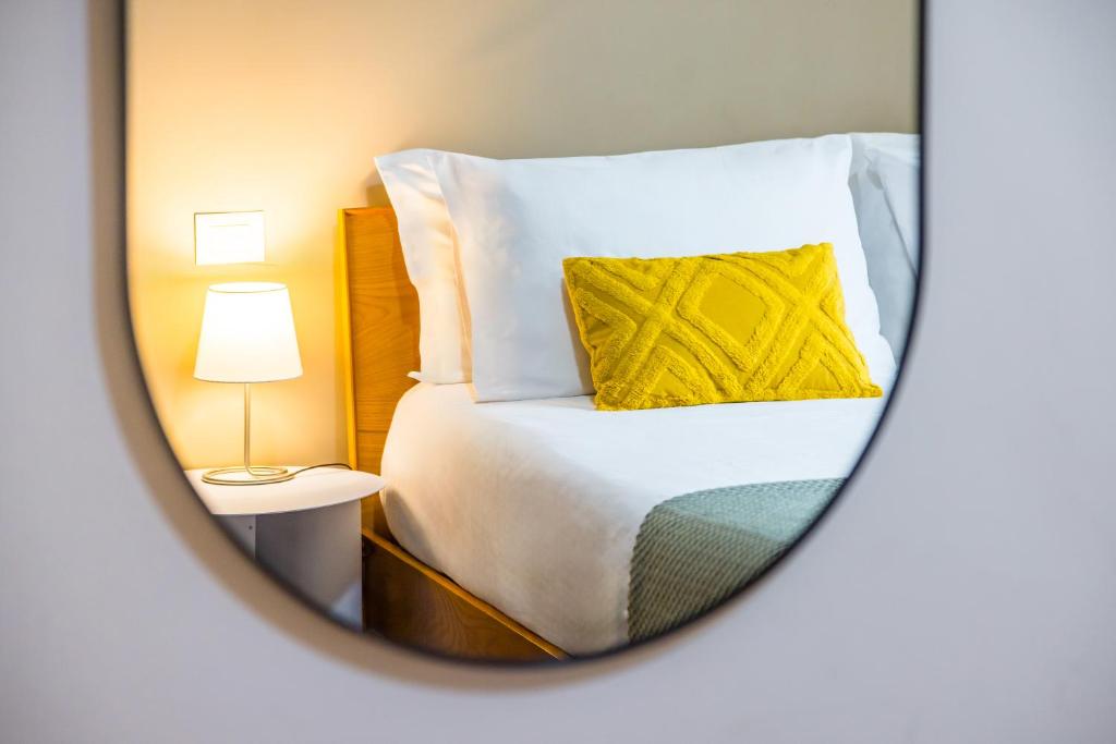 Katil atau katil-katil dalam bilik di Direlo Guest House