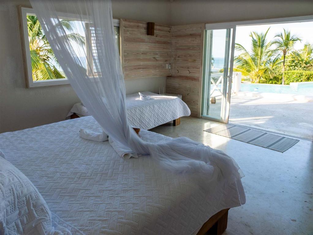 Una cama o camas en una habitación de JandalaVillage