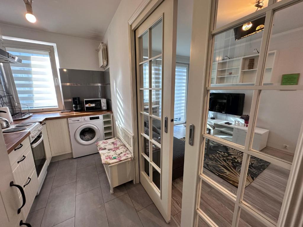Kuchyňa alebo kuchynka v ubytovaní CityApartHome6 CENTRUM PARKING