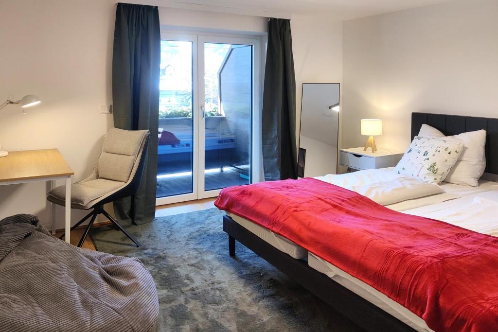 Postel nebo postele na pokoji v ubytování NA-Home Kitzbühel