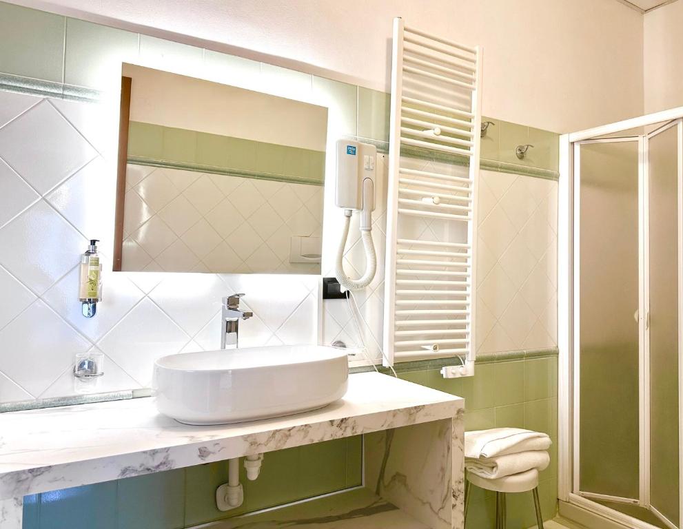 Koupelna v ubytování Hotel Leonardo