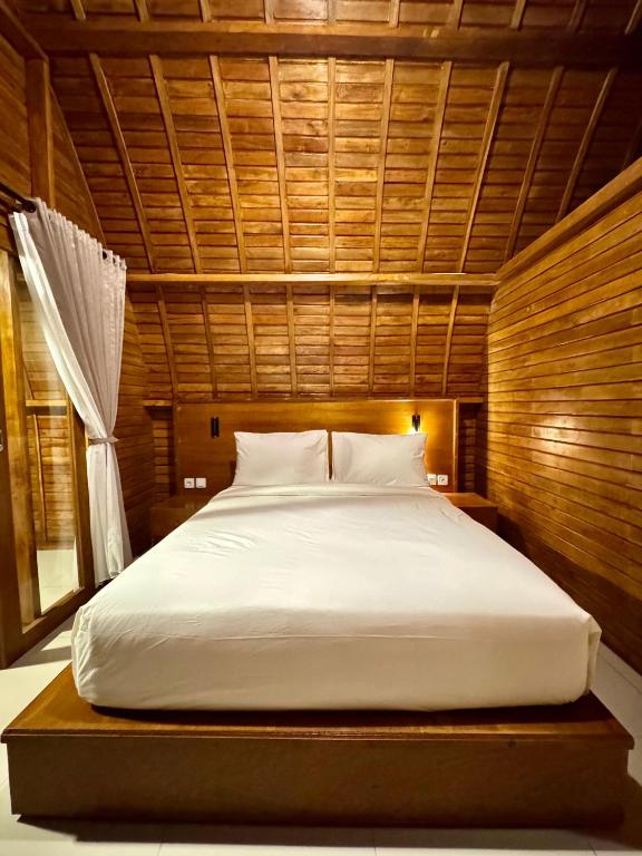 Postel nebo postele na pokoji v ubytování Ungasan Center Hostel