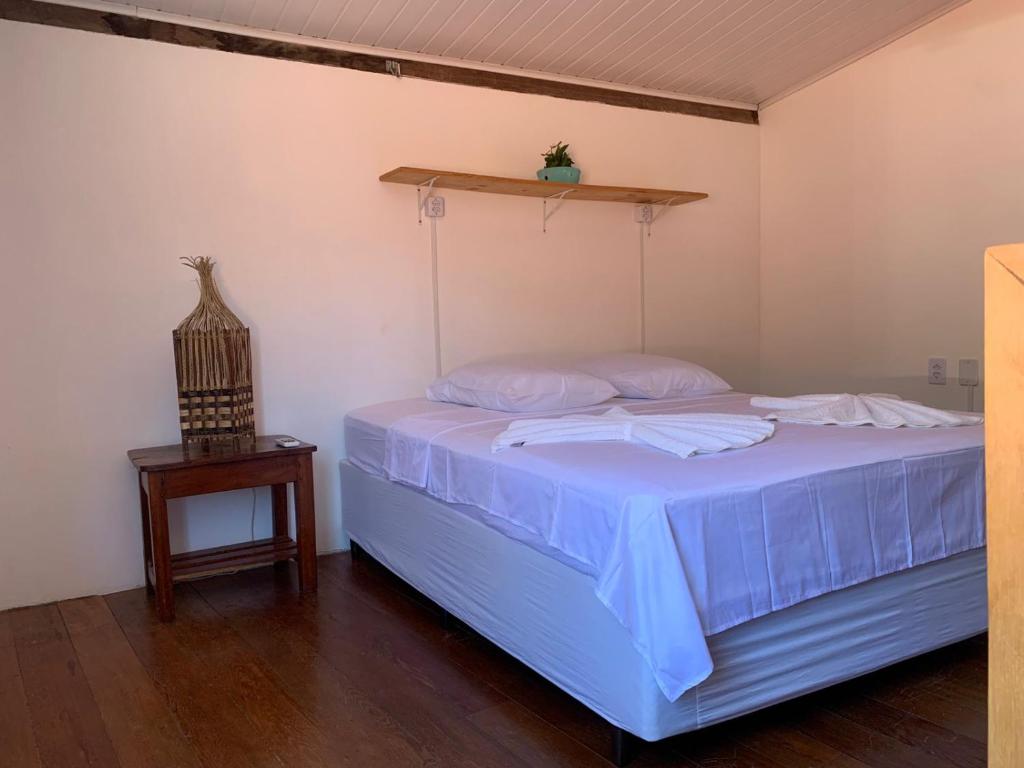 Cama ou camas em um quarto em Buddy's Hostel Itacaré