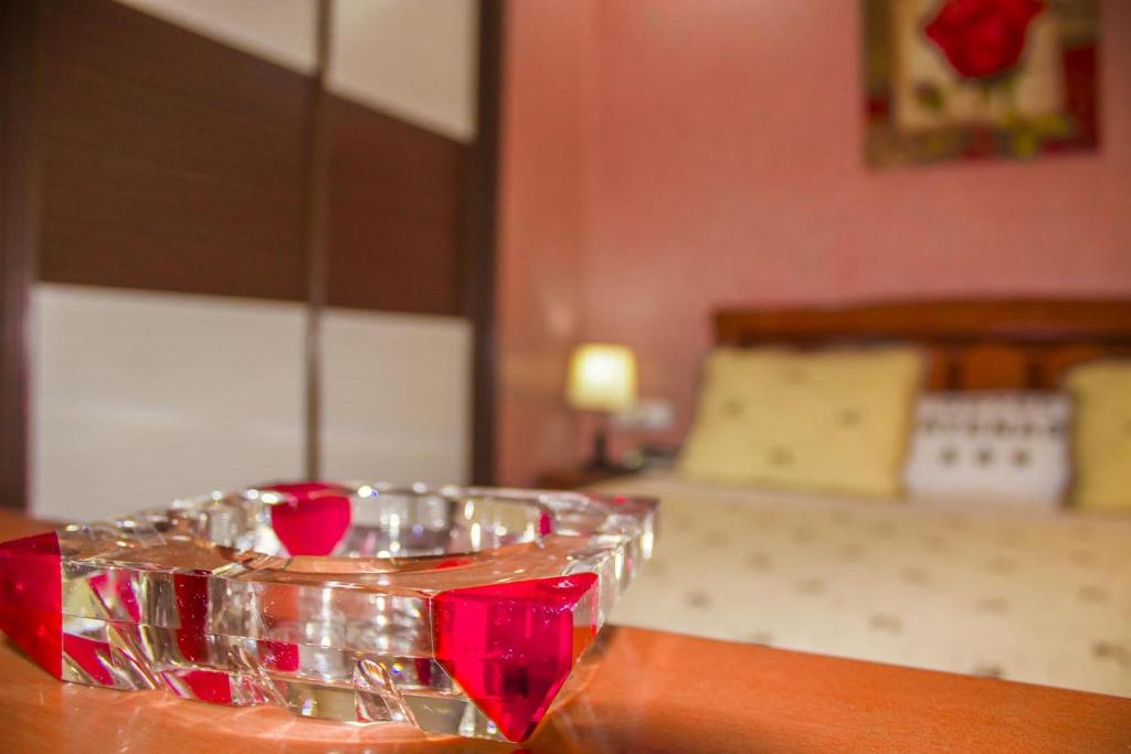 Voodi või voodid majutusasutuse Hôtel Atenas toas