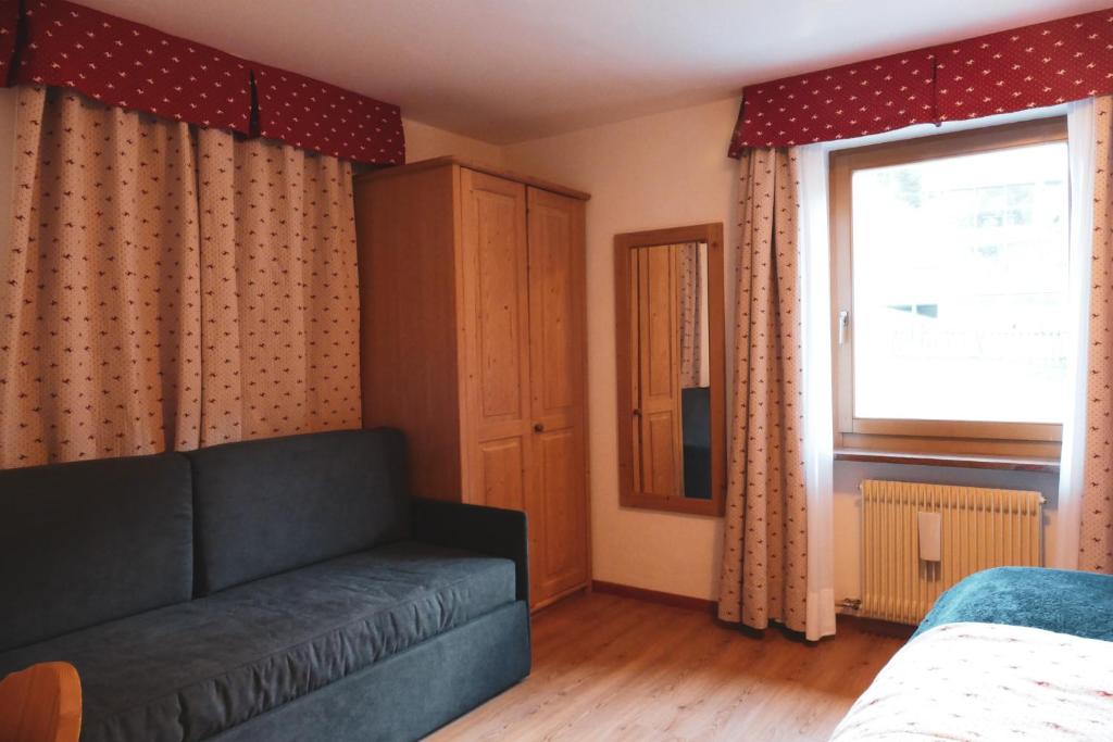 Posezení v ubytování Hotel Malga Passerella