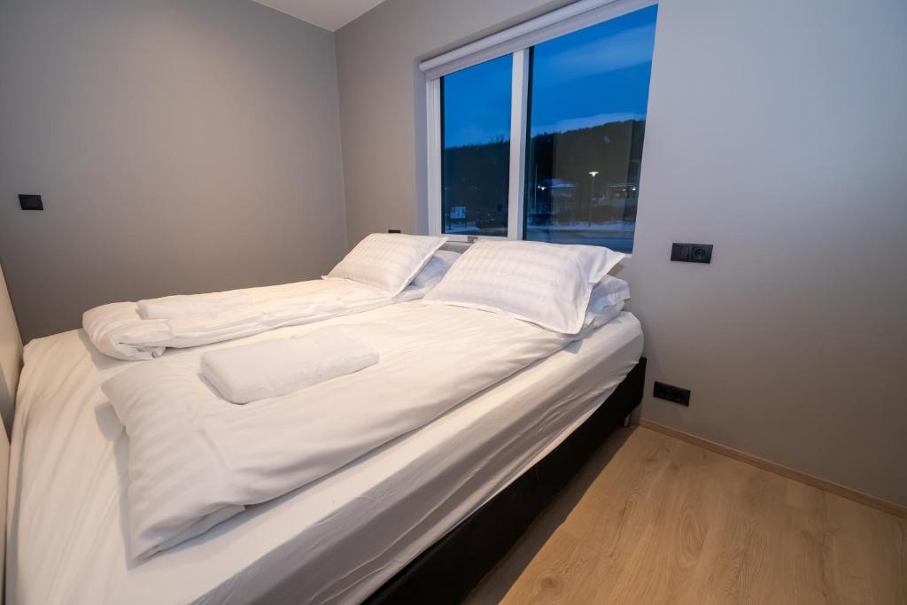 Postel nebo postele na pokoji v ubytování Storigardur Premium Apartments