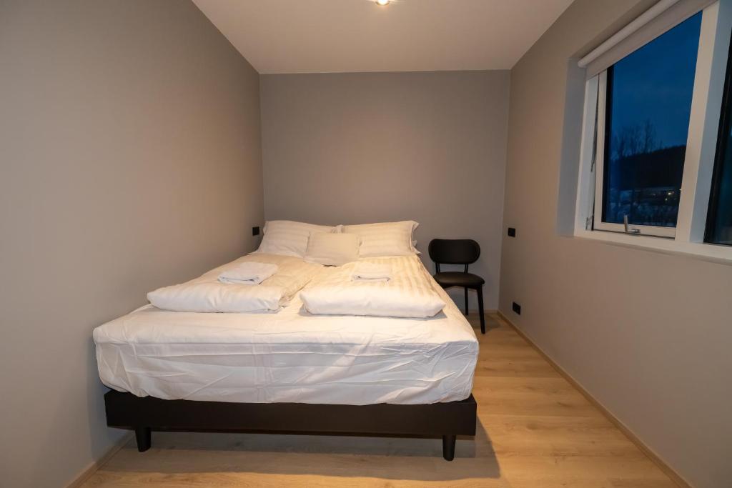 Postel nebo postele na pokoji v ubytování Storigardur Premium Apartments