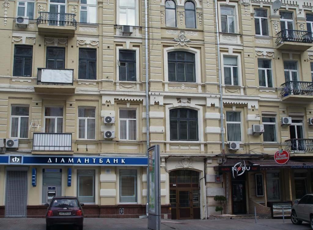 a building with a sign on the side of it at Nelly Apart in Kyiv