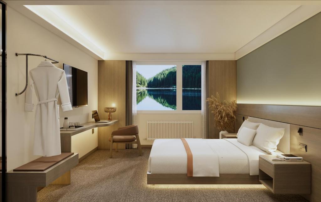 Postel nebo postele na pokoji v ubytování Berghof am See