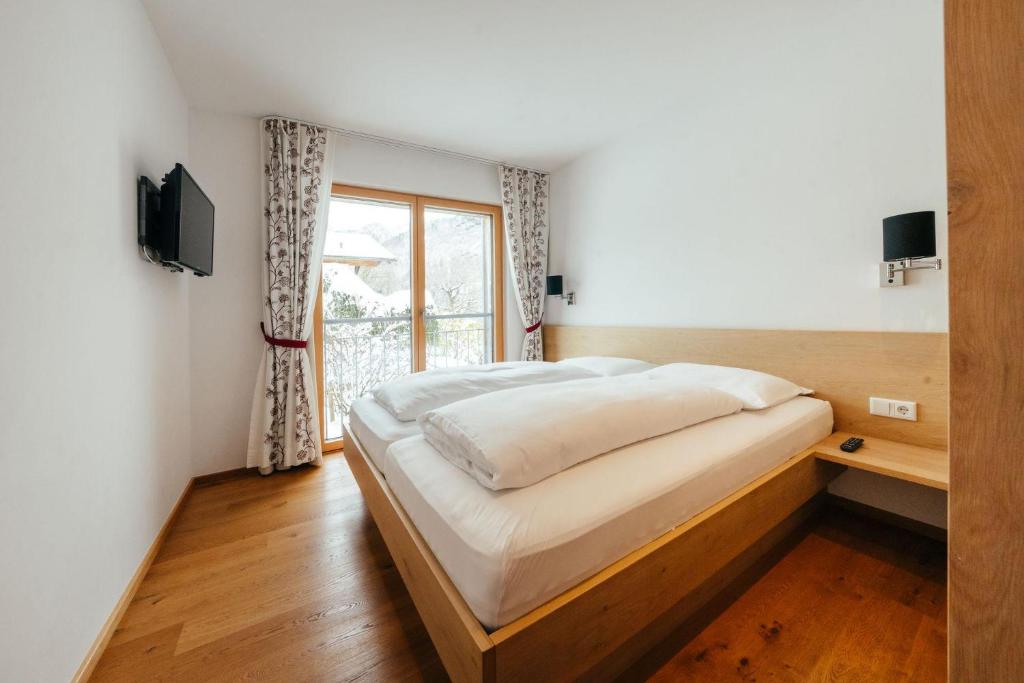 TV a/nebo společenská místnost v ubytování Landhaus Valfontana