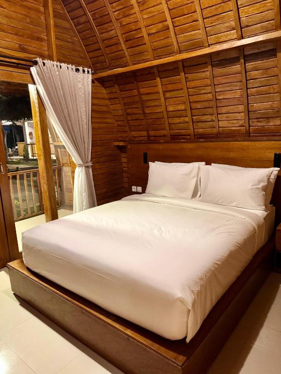 Postel nebo postele na pokoji v ubytování Ungasan Center Hostel
