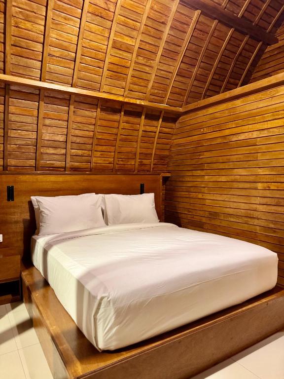 Postel nebo postele na pokoji v ubytování Ungasan Center Hostel
