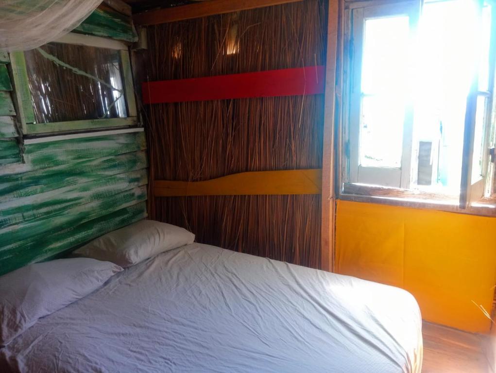 Postel nebo postele na pokoji v ubytování Para un poquito oasis