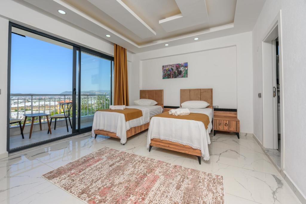 Postel nebo postele na pokoji v ubytování Villa Arna ELİTE