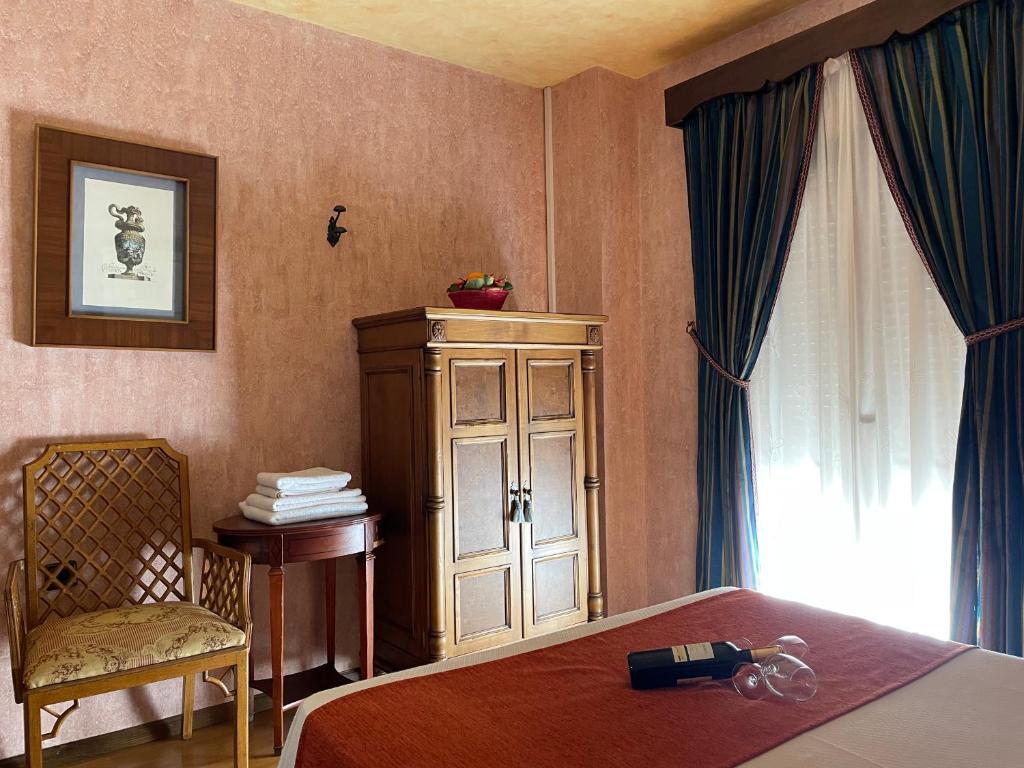 Cama o camas de una habitación en La Posada del Hidalgo de Alarcón