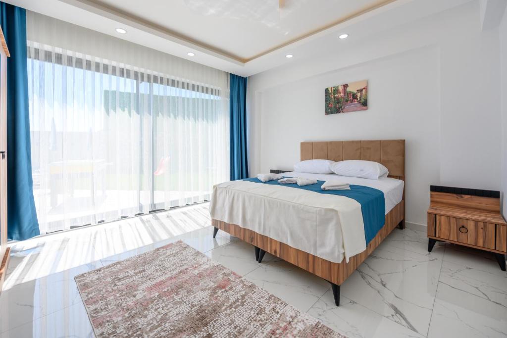 Postel nebo postele na pokoji v ubytování Villa Arna ELİTE