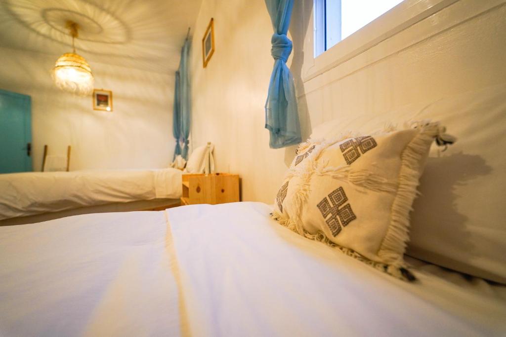 Postel nebo postele na pokoji v ubytování Anza sets house