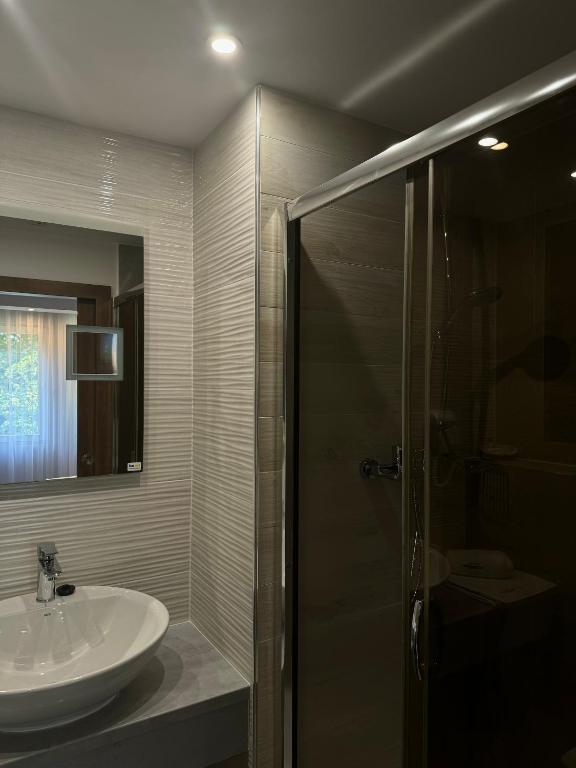 Koupelna v ubytování Hotel Europa