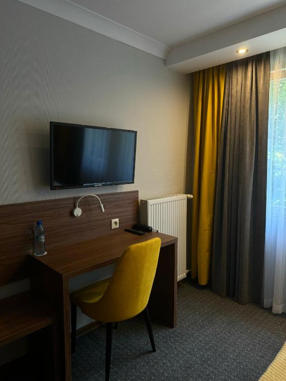 TV a/nebo společenská místnost v ubytování Hotel Europa