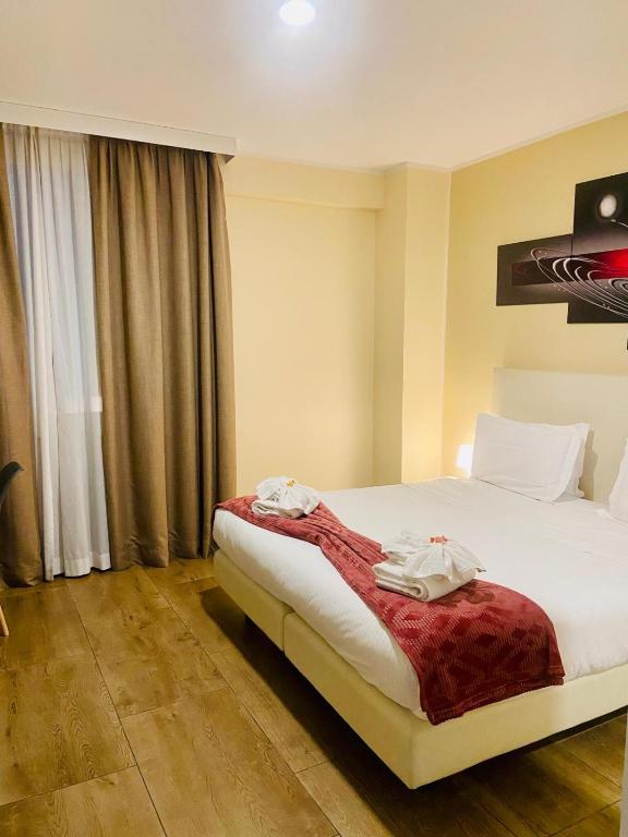 Postel nebo postele na pokoji v ubytování Verona Enjoy