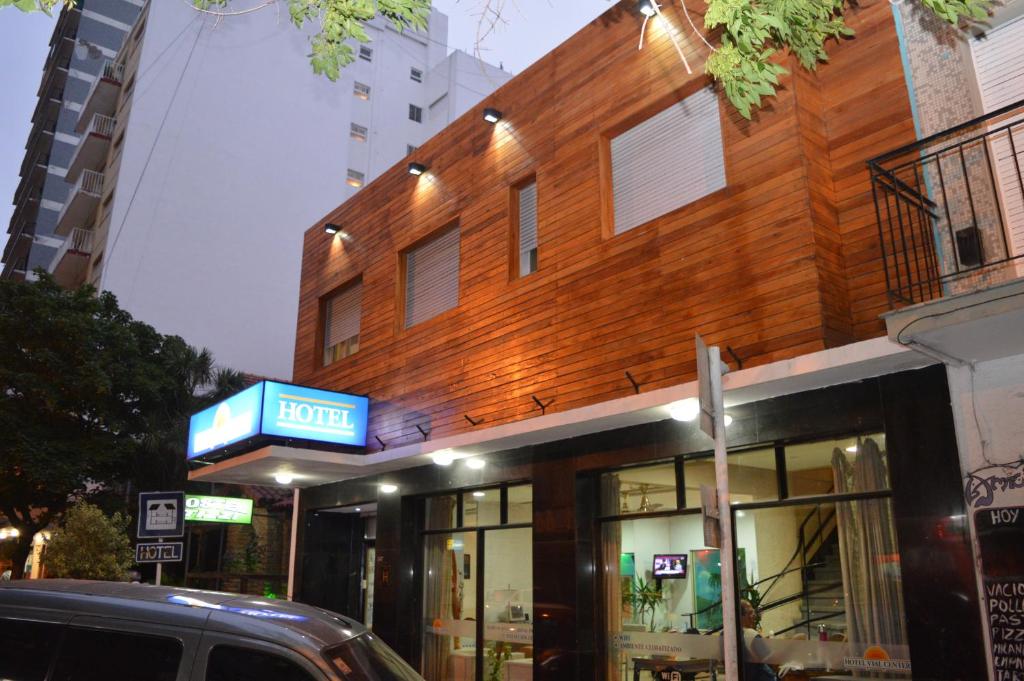 a building with a sign on the side of it at Hotel Vial Center in Mar del Plata