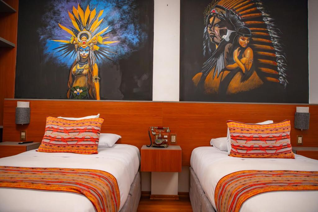 Postel nebo postele na pokoji v ubytování Ausangate Hotel Machupicchu