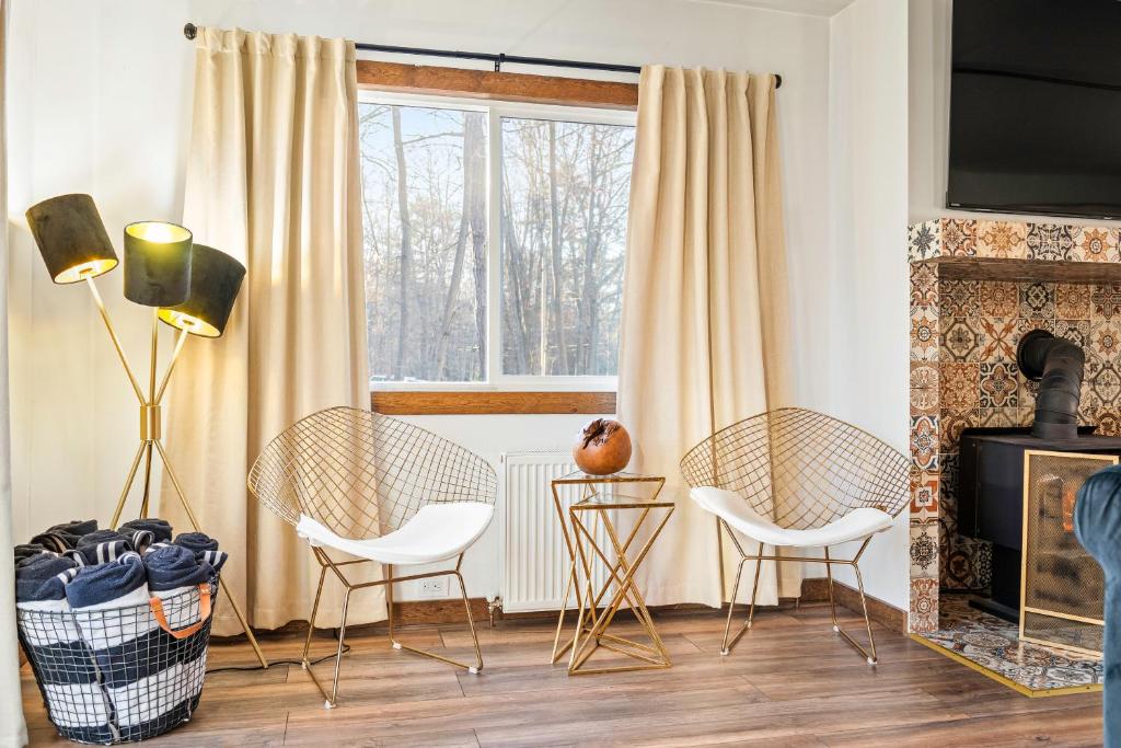 Posezení v ubytování Acute Chalet - Cozy I Elegant I Serene